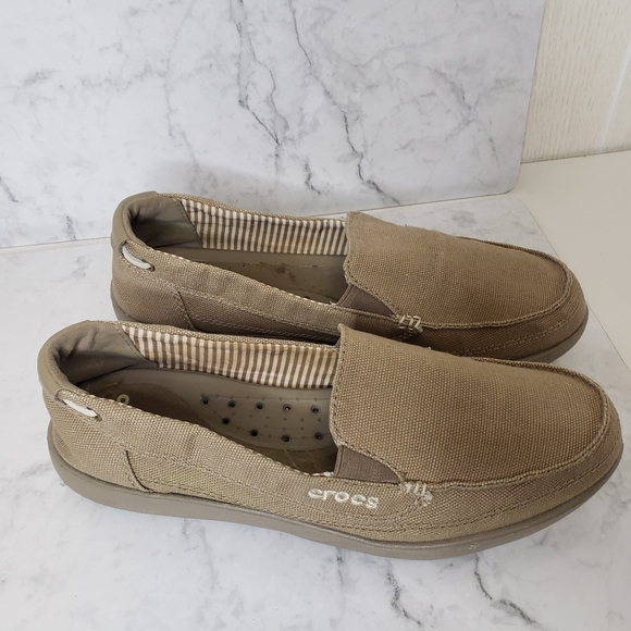 CROCS Shoes - CROCS ladies tan canvas slip on shoes size 9